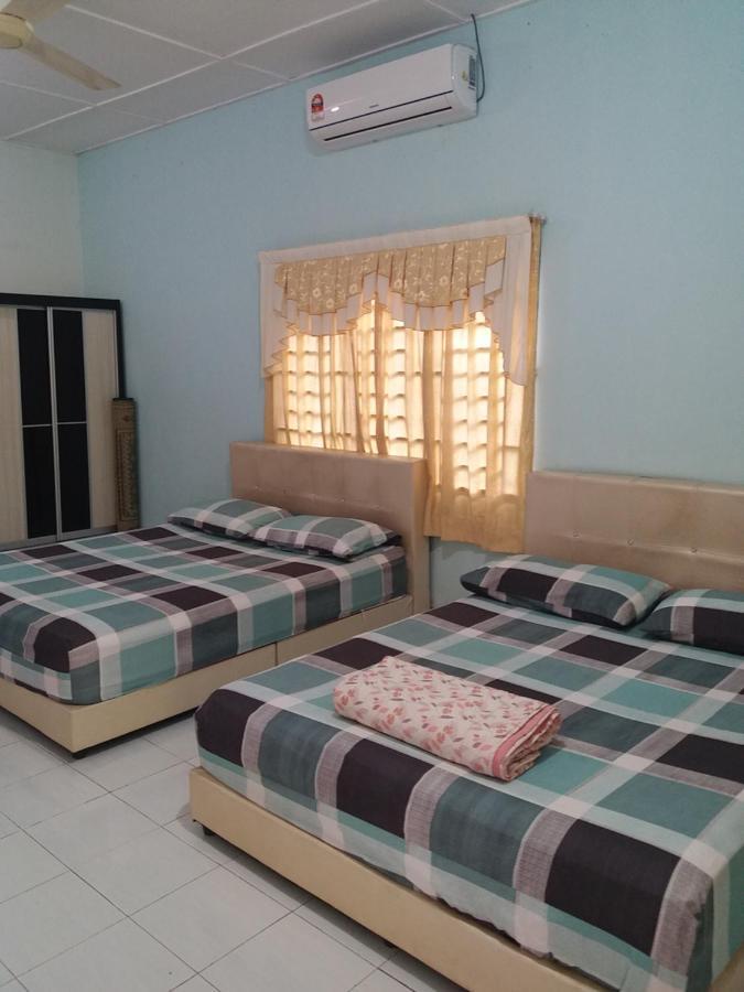 Dhia Irdina Homestay Paya Rewak Buitenkant foto