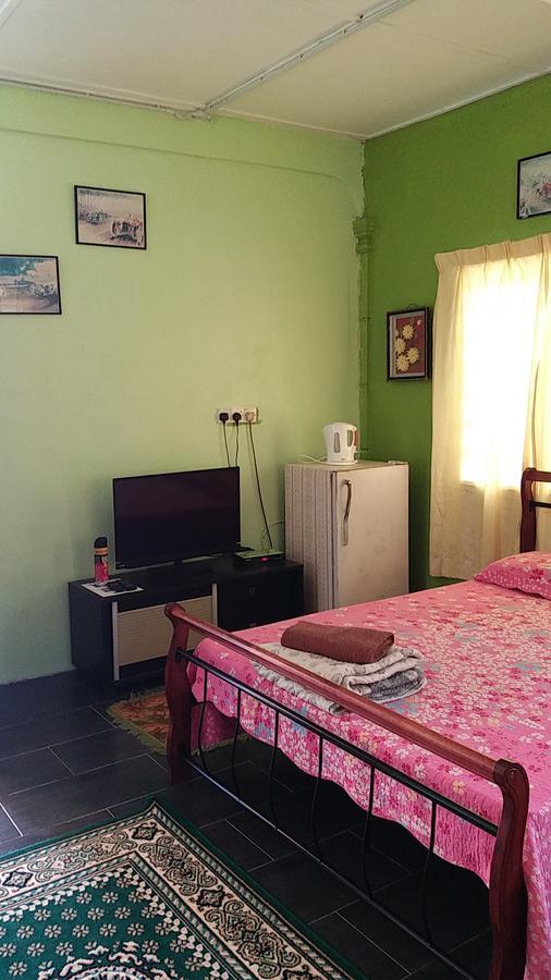Dhia Irdina Homestay Paya Rewak Buitenkant foto